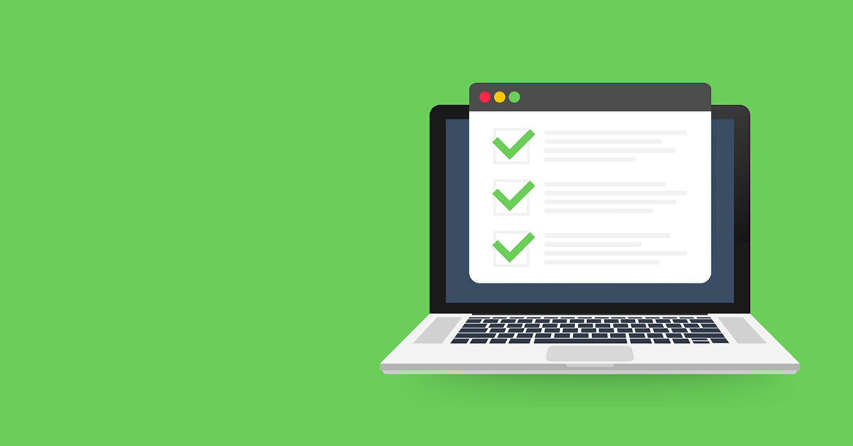 A laptop with green ticks against a green background